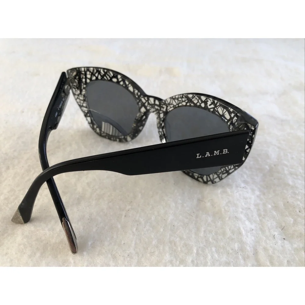 L.A.M.B. LAMB SUN LA503 Blk/white Crossed Lines, Sunglasses 50 20 135